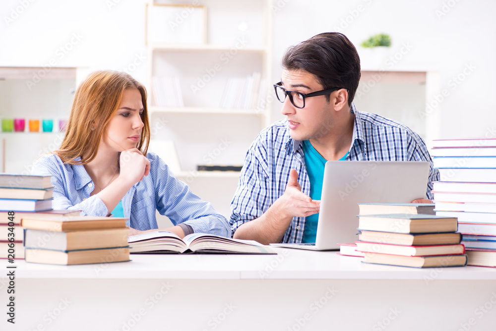 Distance online study learning concept with two students Distance online study learning concept with two students