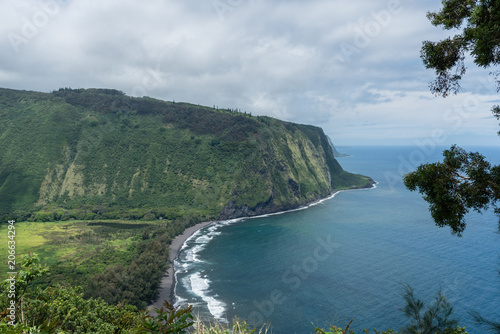 Beautiful Waipio Valley vista on the Big Island of Hawaii after the waterfall going strong after rainstorms 