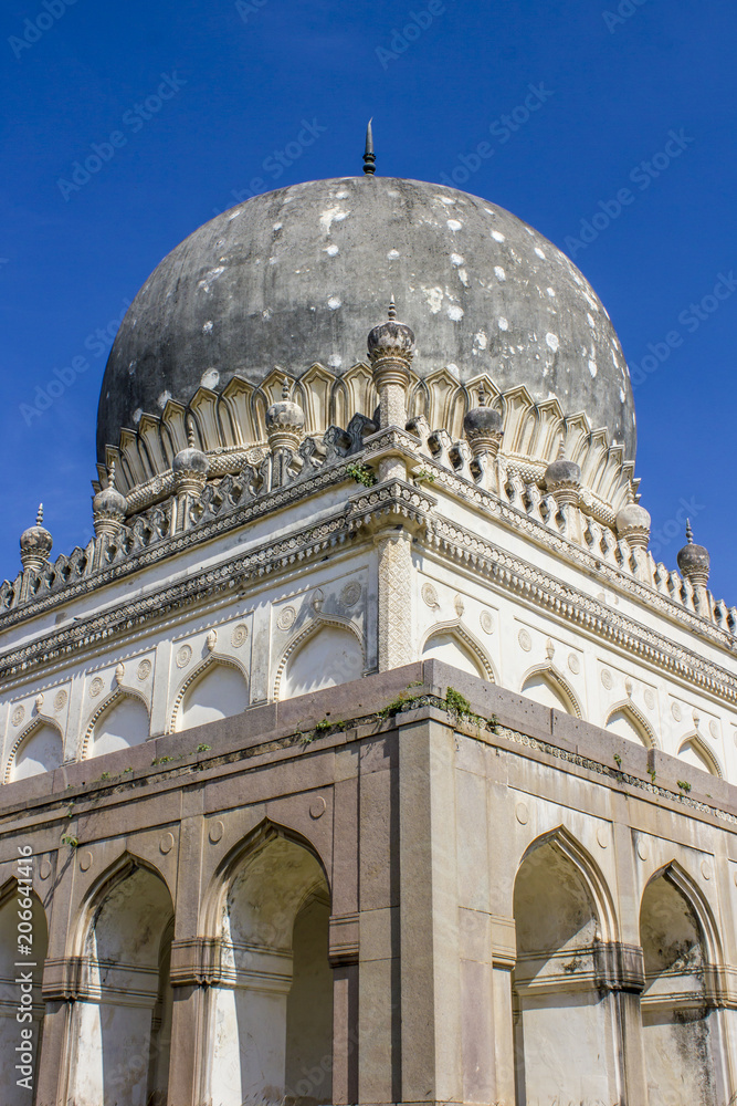 Perspective Looking up from the Corner of One of the Tombs as Its Dome Reaches up into the Bright Blue Sky at the Qutb Shahi Tombs in Hyderabad, India