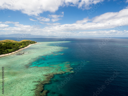 Aerial Landscape View of Tropical South Pacific Island Peninsula Surrounded by White Sand Beach  Ocean and Reef in Fiji