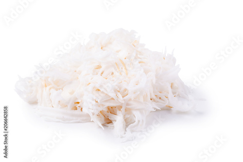 Slice of young coconut meat isolated on white background