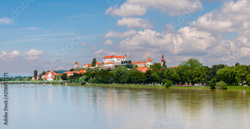 Ptuj, Slovenia, panoramic shot of oldest city in Slovenia with a castle overlooking the old town from a hill, clouds time lapse
