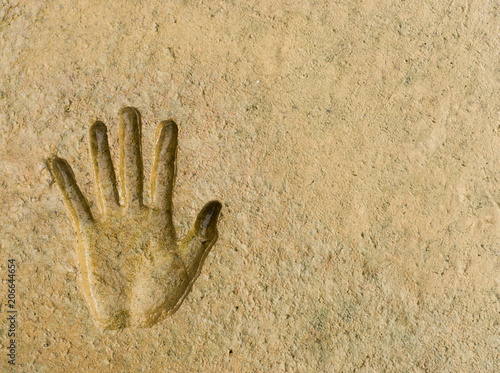 Hand print on mud ground