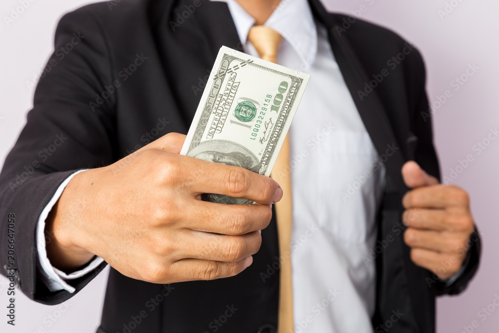Businessman with money in studio . Business concept Businessman with money in studio . Business concept