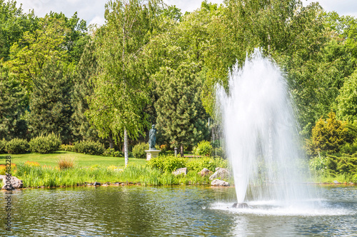 Fountain on the lake in the landscape park Mezhigirya near Kiev  Ukraine.