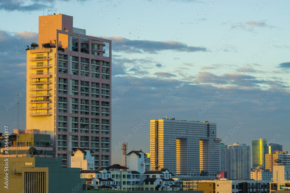 Bangkok city skyline with modern building sunset with cloud