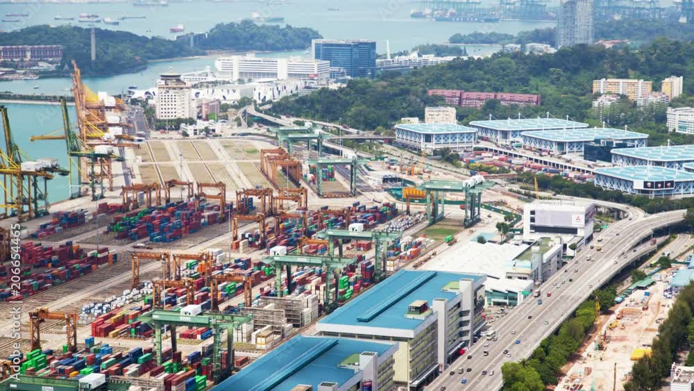 Container cranes in port terminal Singapore timelapse Container cranes in port terminal Singapore timelapse