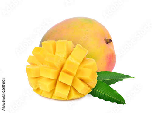 whole and slices ripe mango with leaves isolated on white background