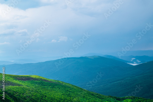 tops of the mountains and rainy clouds of the landscape 