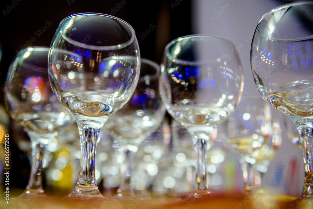 Glass glasses stand on a buffet table Glass glasses stand on a buffet table