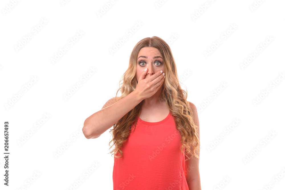 Terrified young woman staring at the camera Terrified young woman staring at the camera