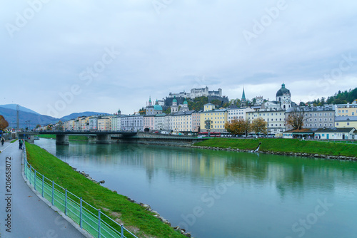 View of Salzach river embankment and Hohensalzburg Castle, Salzburg, Austria