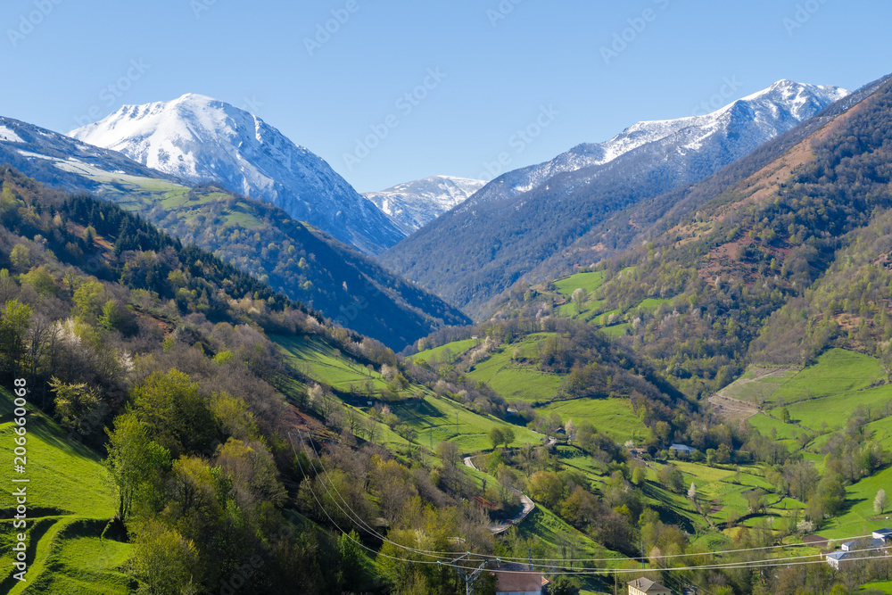 Valle de Leitariegos, in Asturias, with the summits of the mountains covered by the snow of spring