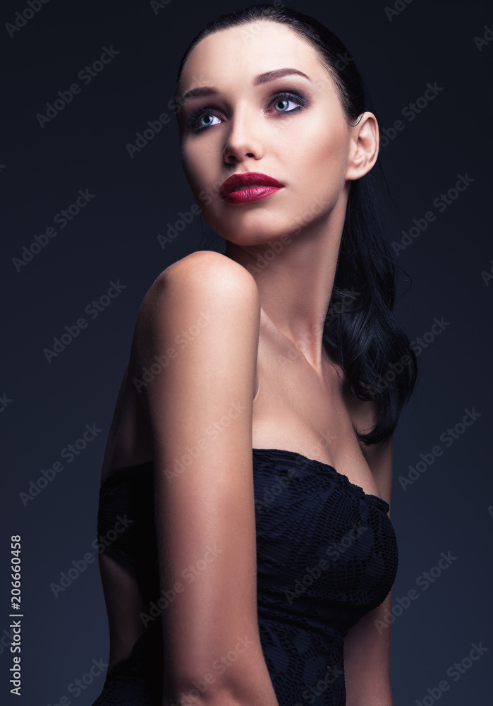 Studio fashion shot: portrait of lovely young woman Studio fashion shot: portrait of lovely young woman