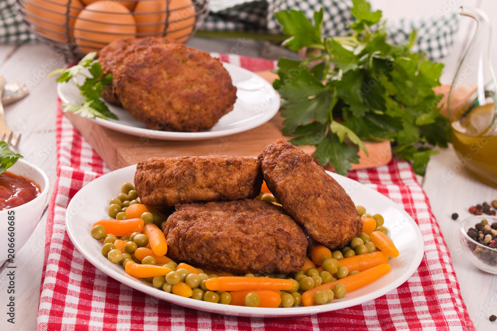 Meatballs on white dish. 