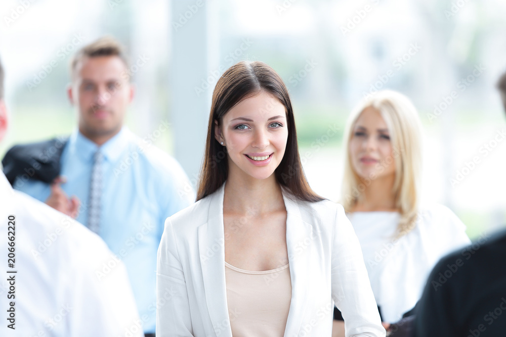 confident business woman among his colleagues confident business woman among his colleagues