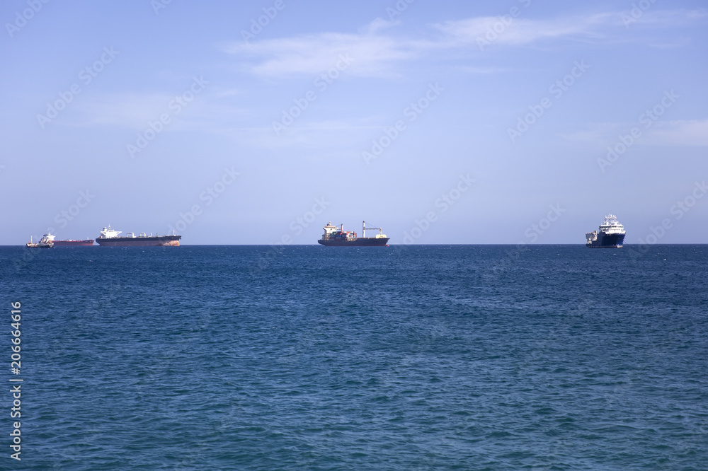 Cargo ships on the horizon