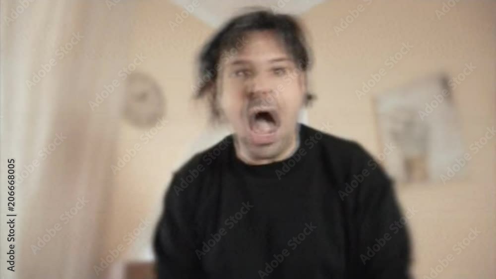 Analog capture (intentional heavy distortion fx): an angry man scolding ...