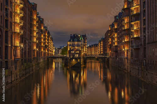 View to the illuminated moated castle at Hamburg   Germany