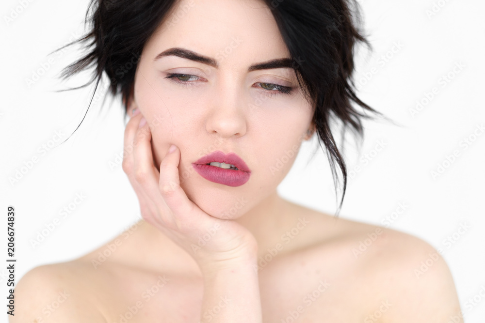 emotion face. sad depressed downcast gloomy low spirited woman. young beautiful brunette girl portrait on white background. emotion face. sad depressed downcast gloomy low spirited woman. young beautiful brunette girl portrait on white background.