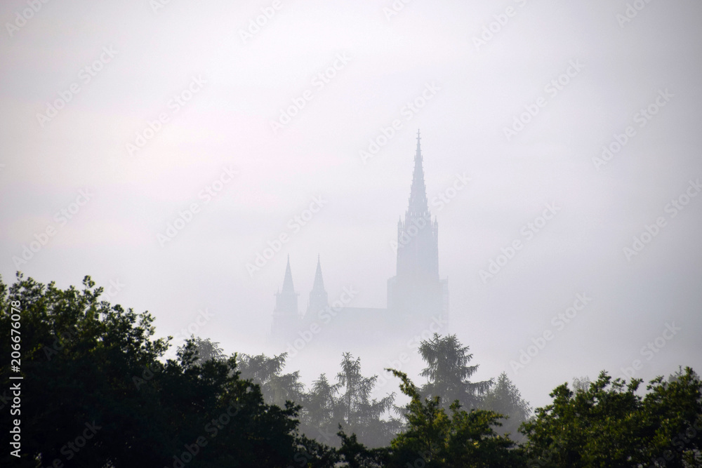 cathedral of ulm shrouded in the deep fog cathedral of ulm shrouded in the deep fog