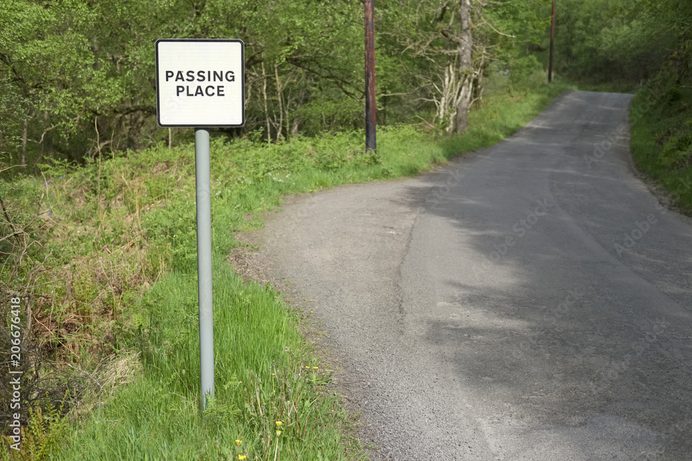 Passing place road sign post wilderness rural countryside safety danger caution Scotland uk