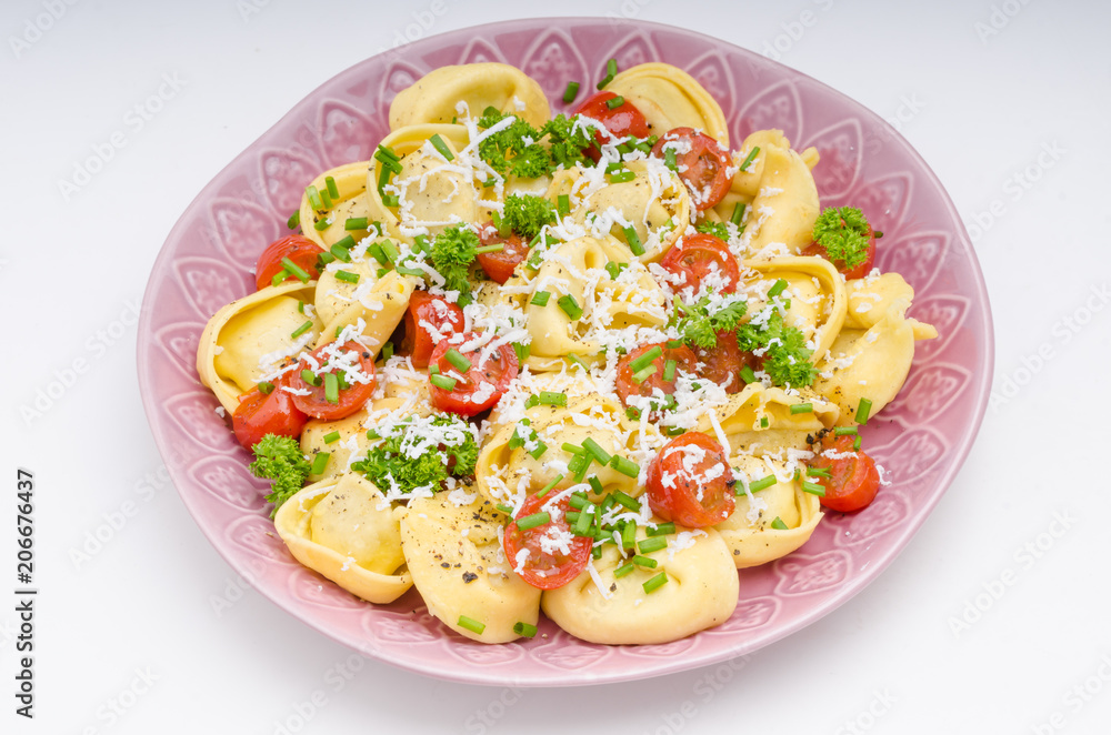 Filled tortellini with herbs, tomatoes Filled tortellini with herbs, tomatoes