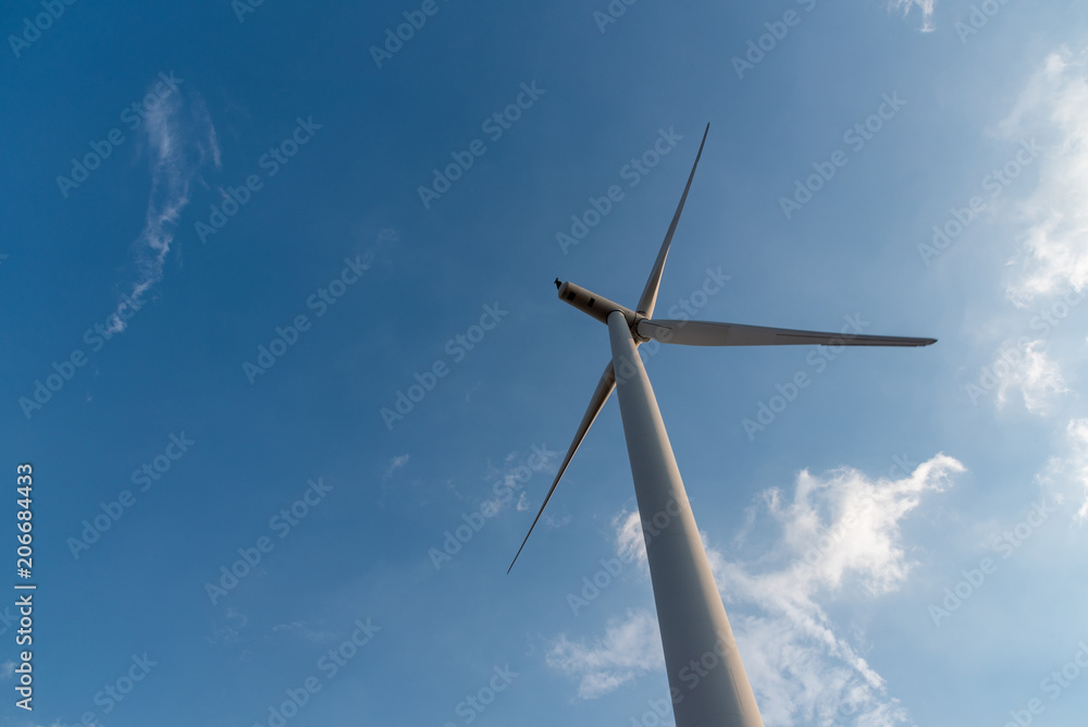 Wind turbine farm and agricultural fields. aerial shot Wind turbine farm and agricultural fields. aerial shot