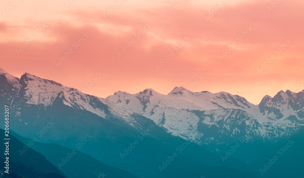 mountains at sunset with red sky