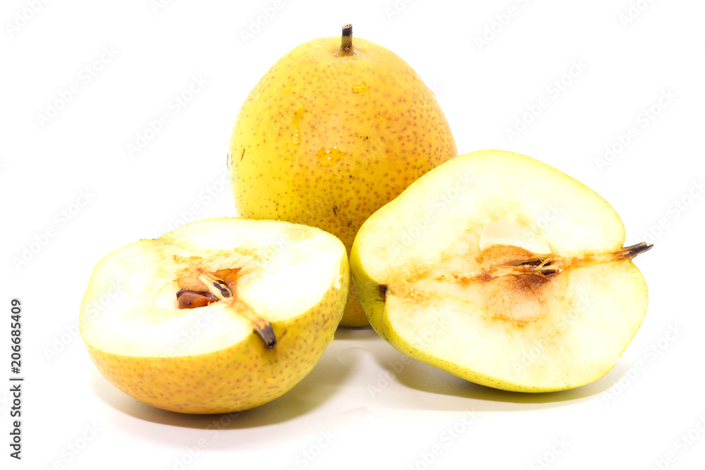Two yellow Fresh ripe organic pears and half pear