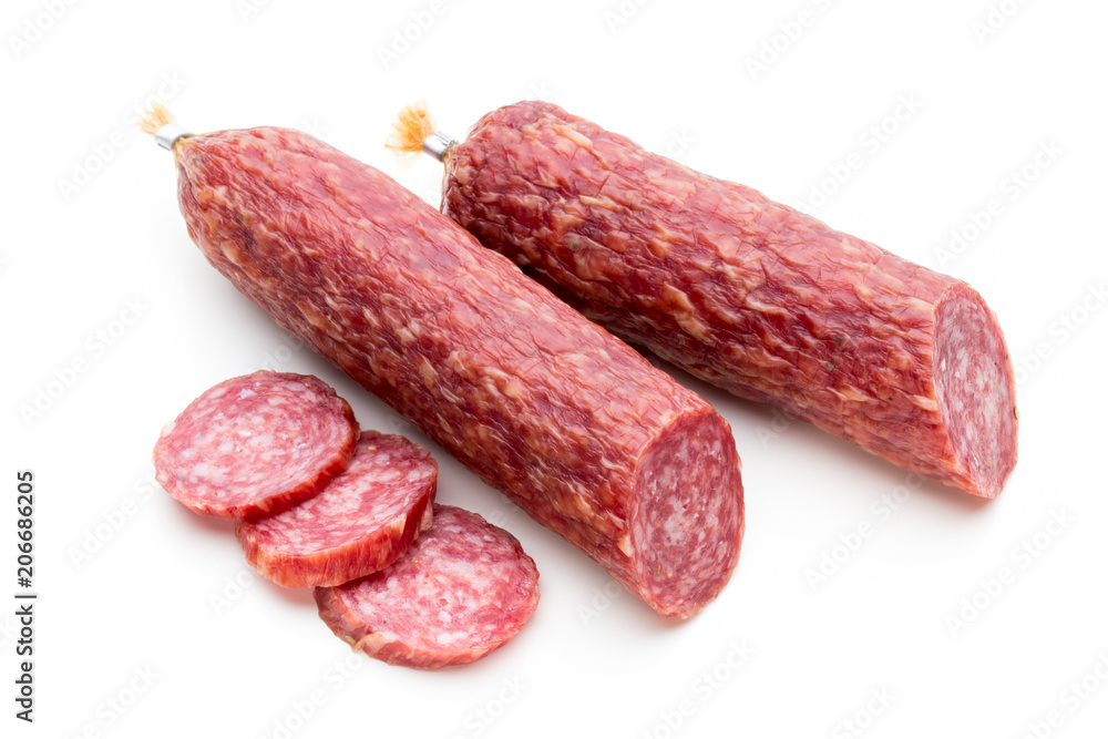 Salami smoked sausage, basil leaves and peppercorns isolated on white background. Salami smoked sausage, basil leaves and peppercorns isolated on white background.