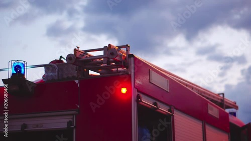 Fire truck with flashing lights on