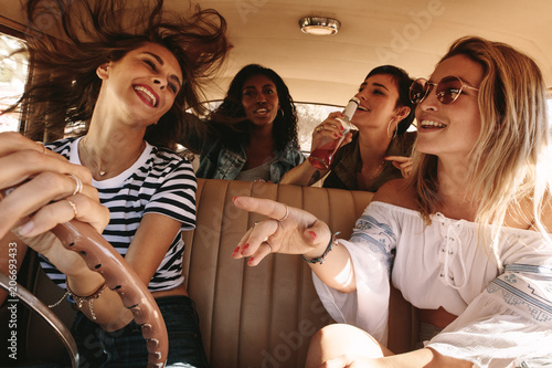 Fotografia, Obraz Girls having fun on road trip