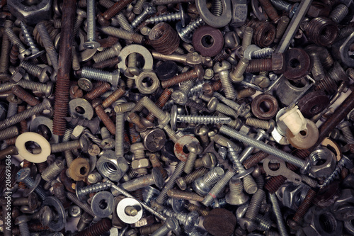 Grunge rusty metal screws and details. Old screws.
