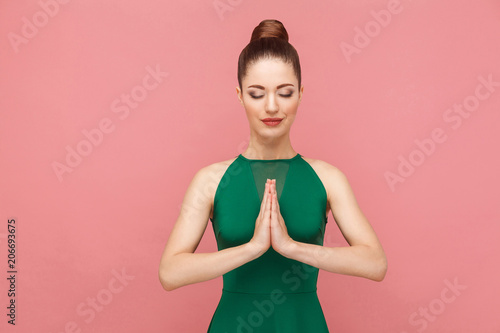 Spiritual practice. Woman closed eyes, doing meditation, mudram peace