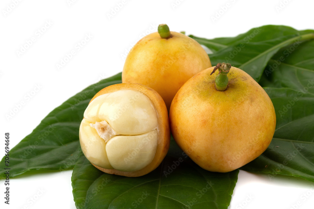 Rambeh tropical fruit with leaf isolated on white background