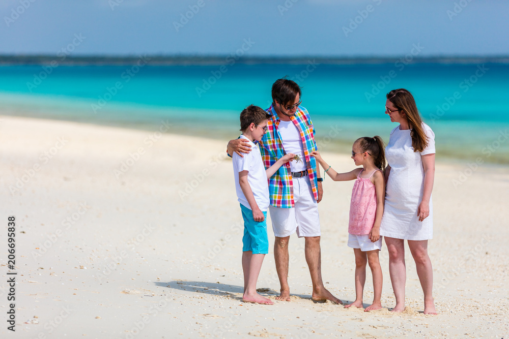Family on a tropical beach vacation Family on a tropical beach vacation