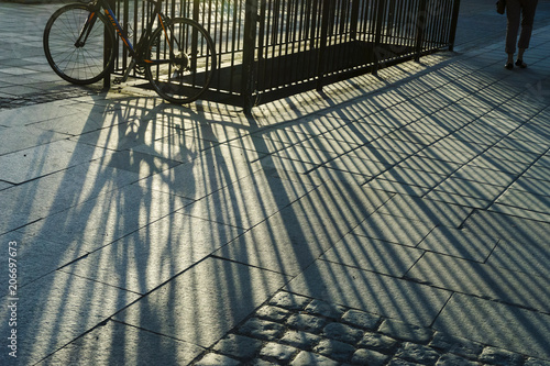 Canvas Print Parked bike on a bridge/Bike left on a guardrail on top of a bridge near the Kings Palace in Stockholm
