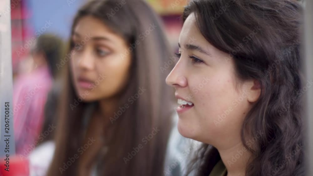 Young Women Order Food To Go From Take Out Window On Boardwalk (Shot On Red Scarlet-W Dragon In 4K, Slow Motion) Young Women Order Food To Go From Take Out Window On Boardwalk (Shot On Red Scarlet-W Dragon In 4K, Slow Motion)