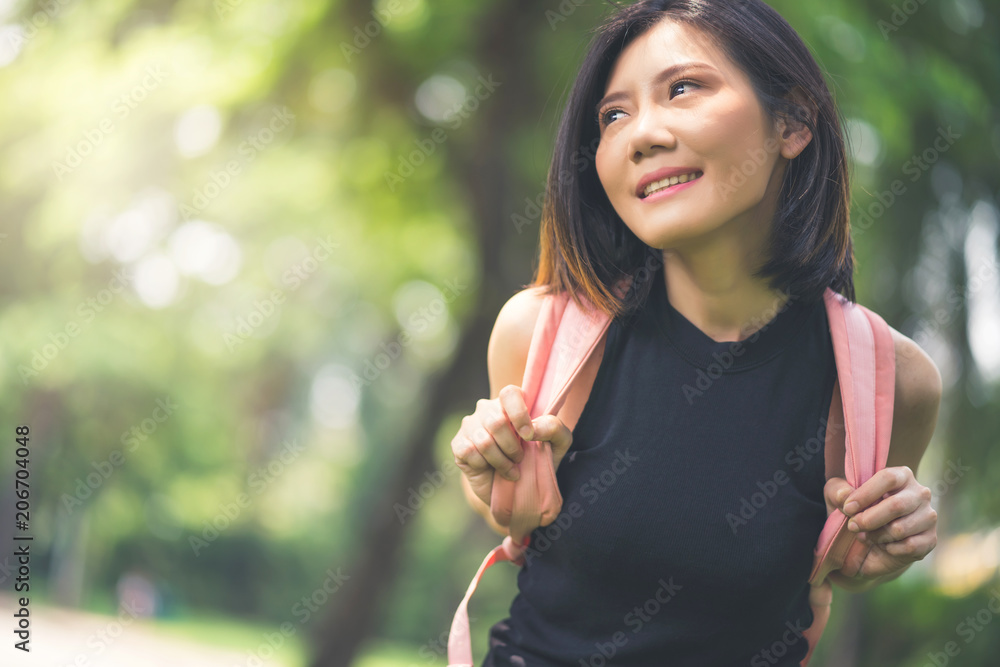 healthy asian woman relax and clam weekend vacation in green park background healthy asian woman relax and clam weekend vacation in green park background