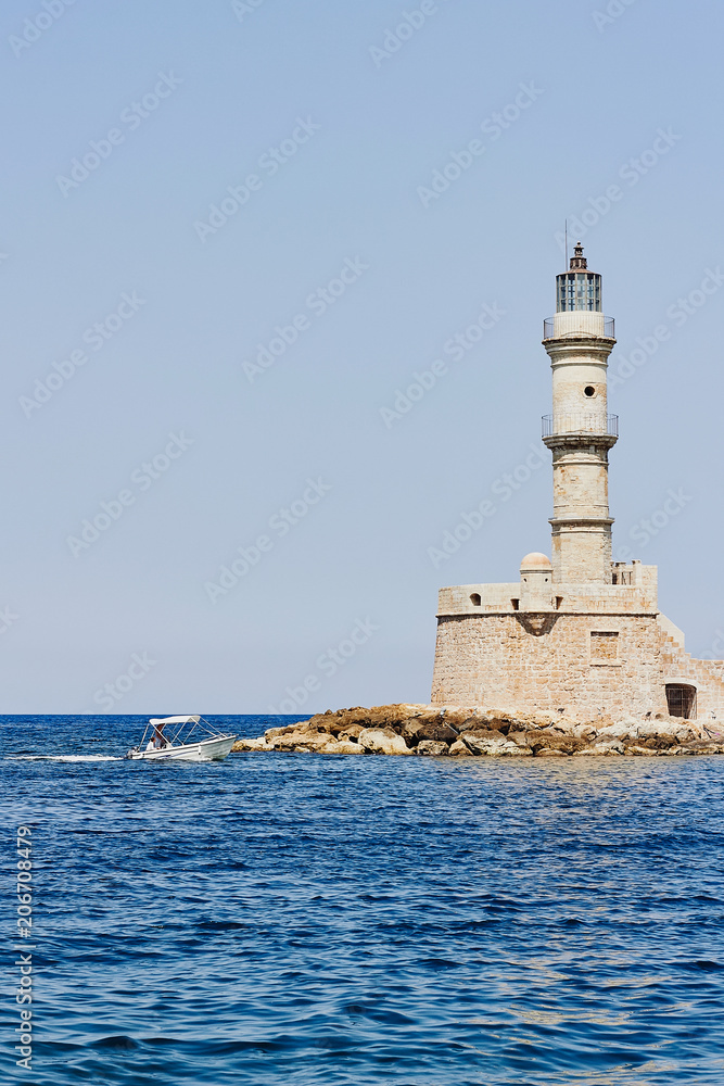 Old lighthouse on the coast of the Mediterranean Sea