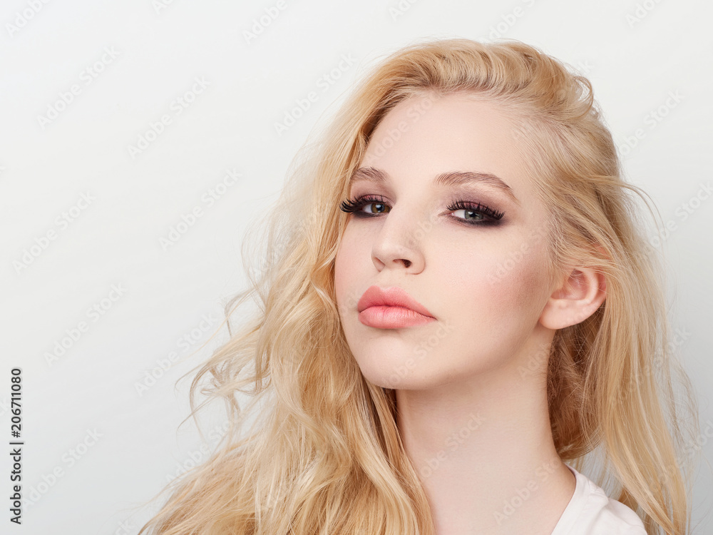 Beauty portrait of model with trendy natural make-up. Fashion shiny highlighter on skin, sexy gloss lips make-up. Beauty portrait of model with trendy natural make-up. Fashion shiny highlighter on skin, sexy gloss lips make-up.