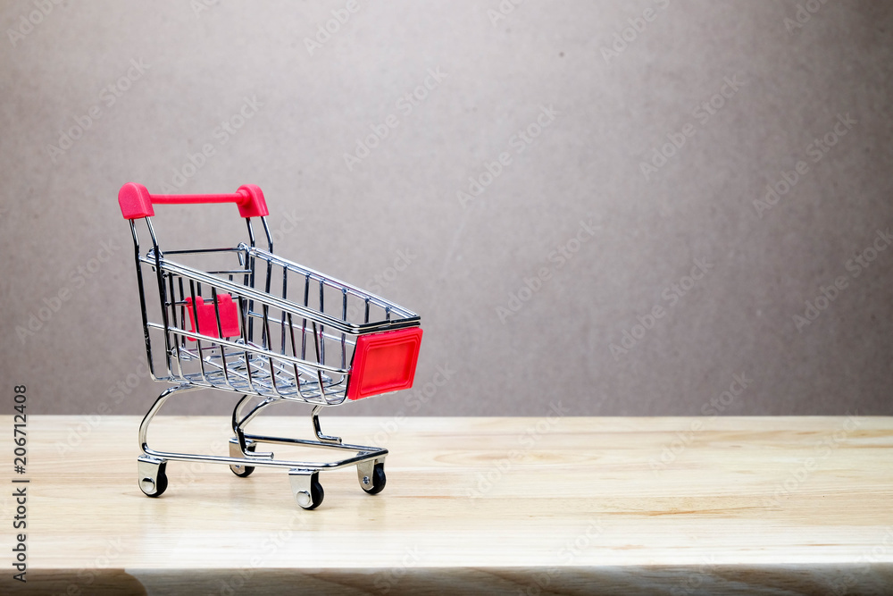 mini shopping cart lover or shopaholic concept mini shopping cart lover or shopaholic concept