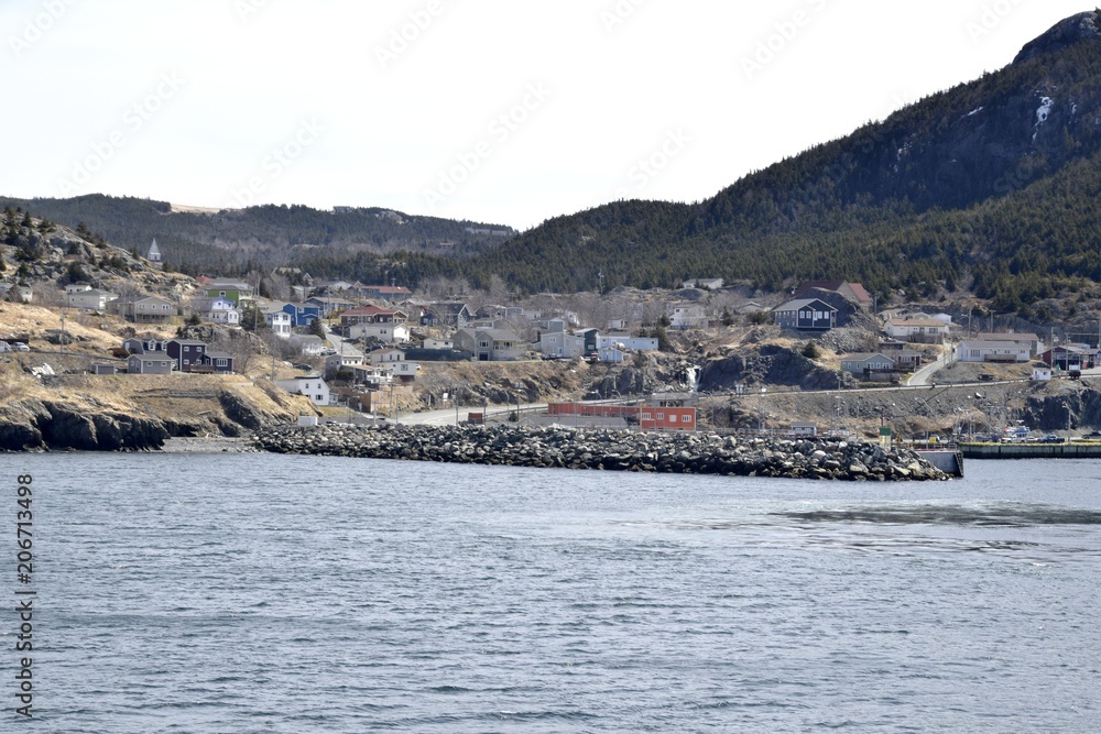 coastline of Portugal Cove near the ferry terminal seen from the ocean, Avalon region Newfoundland, Canada 