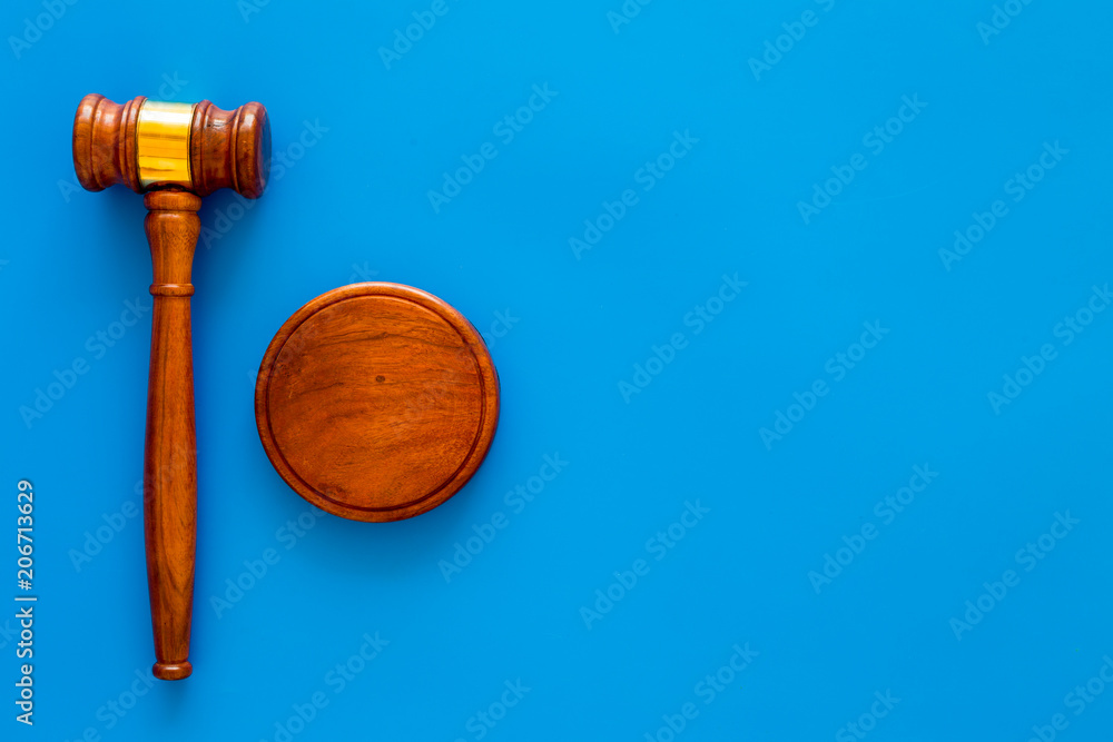 Law and court. Lawyer, attorney, judge concept. Judge gavel on blue background top view copy space Law and court. Lawyer, attorney, judge concept. Judge gavel on blue background top view copy space
