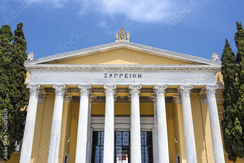 Greece, Athens: Front view of famous Zappeion building in the city center of the Greek capital and part of National Gardens with blue sky in the background - concept architecture travel history photo