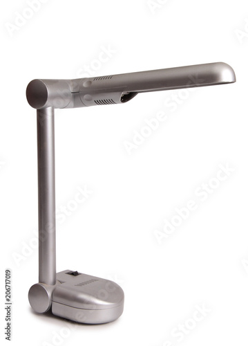 Modern metal table lamp on a white background
