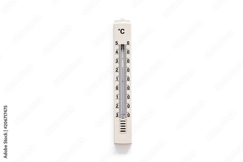 Termometer for measuring temperature outdoor on white background top view copy space Termometer for measuring temperature outdoor on white background top view copy space
