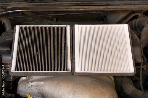 New and old car air filter. Close up.