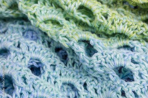 handmade crochet background in blue and green